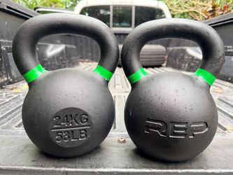 PAIR OF REP FITNESS : 24 KG . / 53 LB. KETTLEBELLS