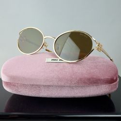 Miu Miu Logo Oval Sunglasses in Gold with Brown Lenses