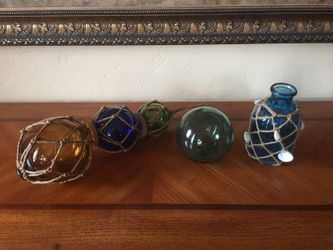 Beautiful blown glass net balls. And blue bottle.