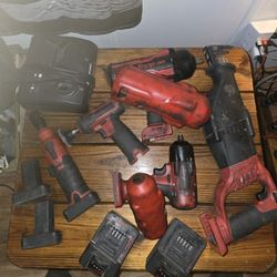 18v 14v Impacts, Sawsall, 1/4 Ratchet, Buffer 4" Side Grinder And Grease Gun.