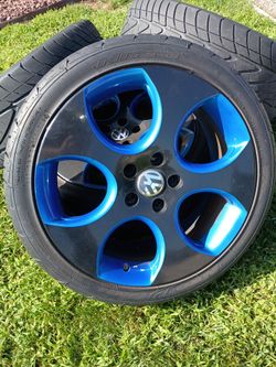 4 VW 18 inch wheels and tires