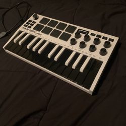 Akai Mini Music Production Keyboard And Drum pads 