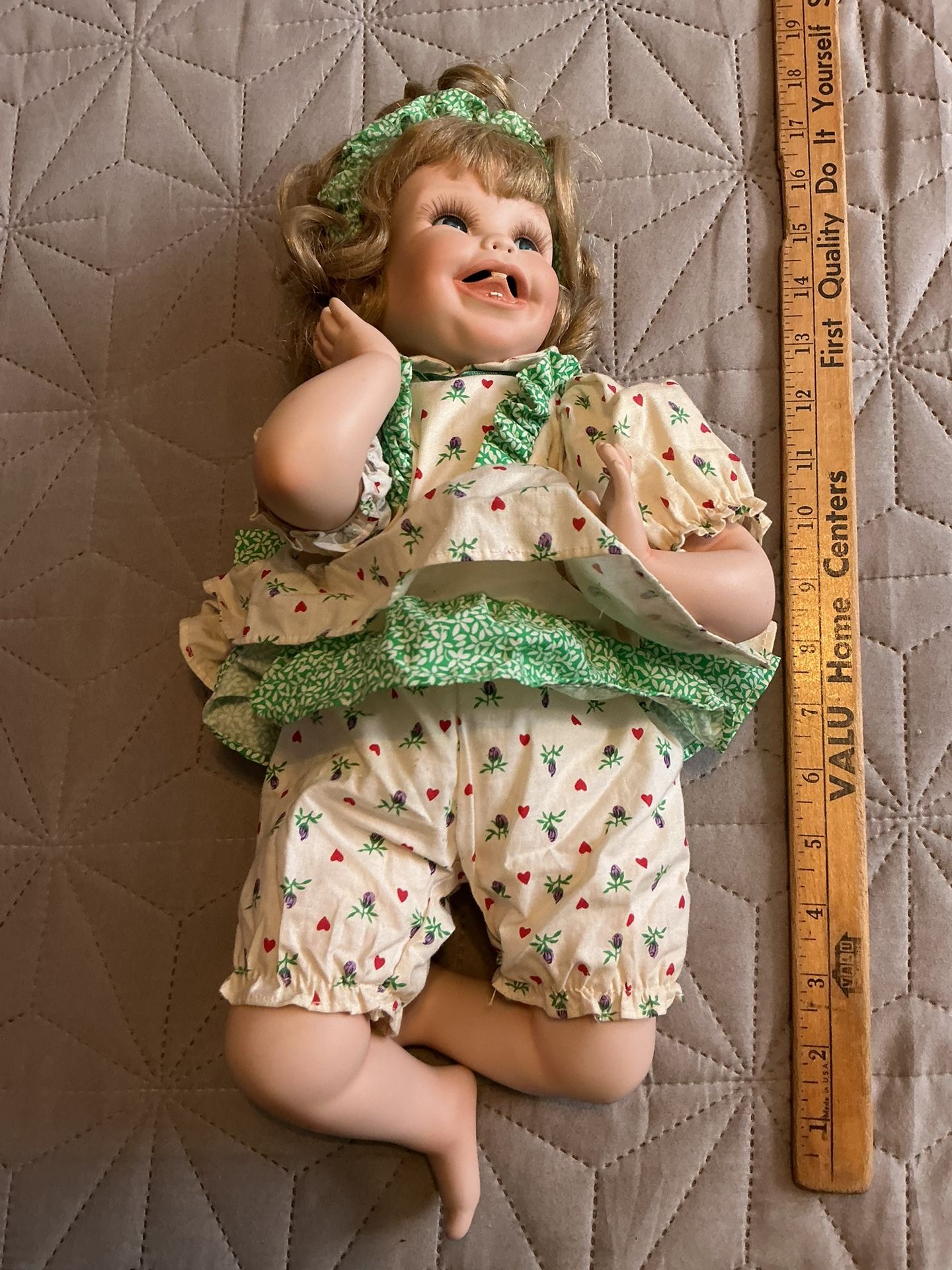 Cute Laughing Blue Eyed Baby Doll
