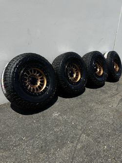 KMC KM552 IMS 6x5.5 17" Wheels Bronze With 33” Falken WildPeak AT4W All-Terrain Tires
