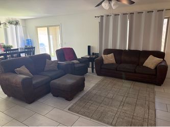 Brown Couches and Recliner with Ottoman