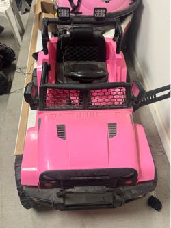 Pink electric toy jeep