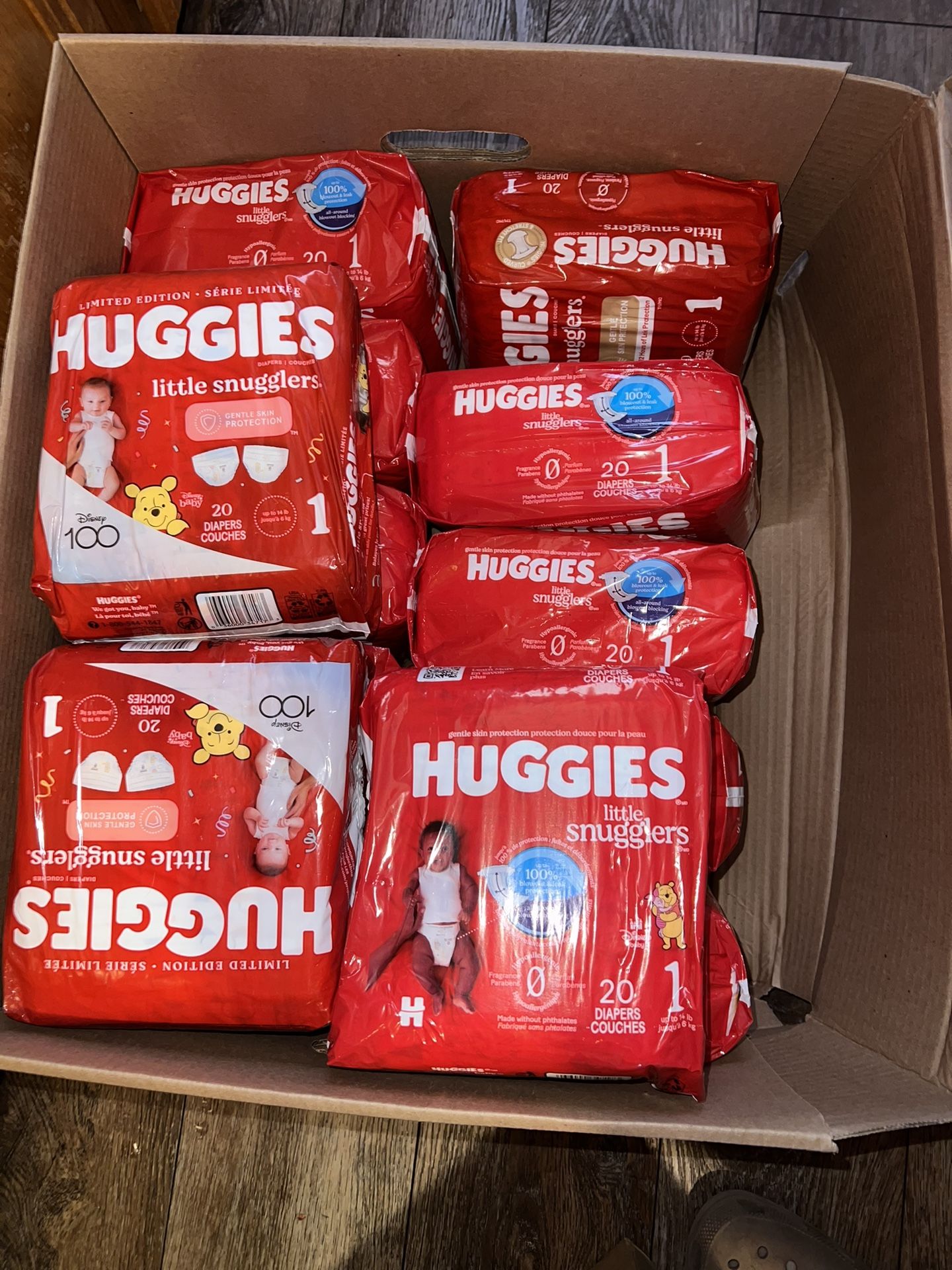 13 Packs Of Size 1 Huggies Diapers 