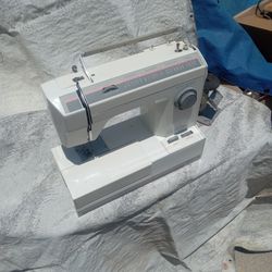 Signature Sewing Machine $30
