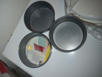 4 WILTON CAKE PANS $15