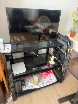 Tcl tv and tv stand $90