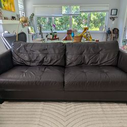 Macy's couch and IKEA ottoman