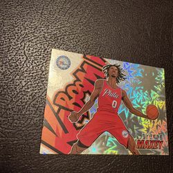 Tyrese Maxey Horizontal KABOOM SSP CASE HIT Panini Revolution 2024-25 Basketball Card!