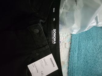 Brand new black skinny midrise black denim size 14