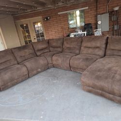 Beautiful Brown Sectional With 4 Recliners 
