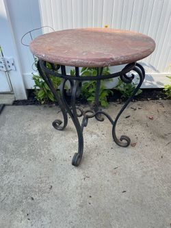 Wrought iron and marble table