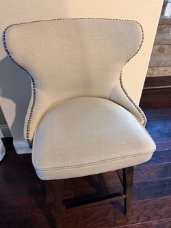 Upholstered Wingback Bar Stool with Nailhead Trim