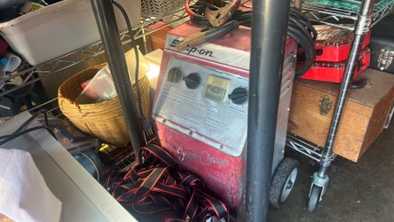 Snap on battery charger