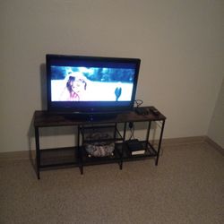 TV Stand and 32 Inch Tv