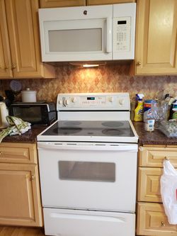 Microwave and stove, Maytag plus fridge and GE Dishwasher
