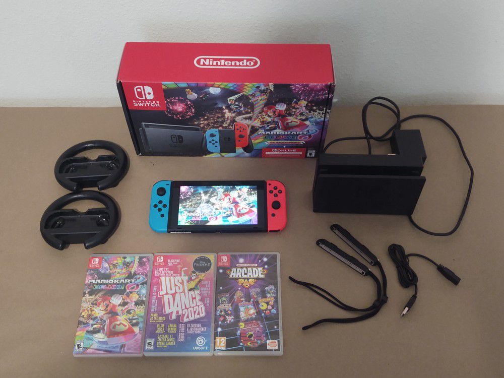 Nintendo Switch Bundle Complete with Mario Kart 8 Deluxe, Games, Wheels, etc.