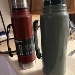 Two Stanley Thermos Vacuum Bottles  