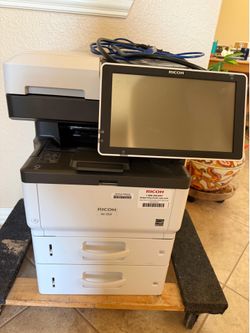 Ricoh Smart Operation Panel device with serial number 3373P251933