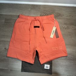 Fear of God Essentials Coral shorts