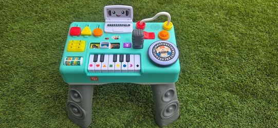 ​Fisher-Price DJ Bouncin’ Beats Electronic Baby & Toddler Learning Toy Activity Station