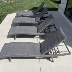 Four Padded Woven Outdoor Chaise Lounge Chair