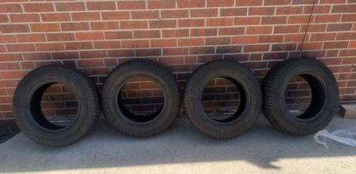 Four Pirelli P-185/70/13in Radials!