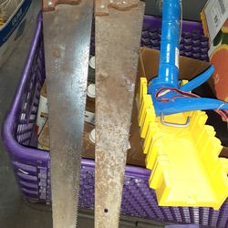 Two Used Saw Miter Saw And A Caulking Gun
