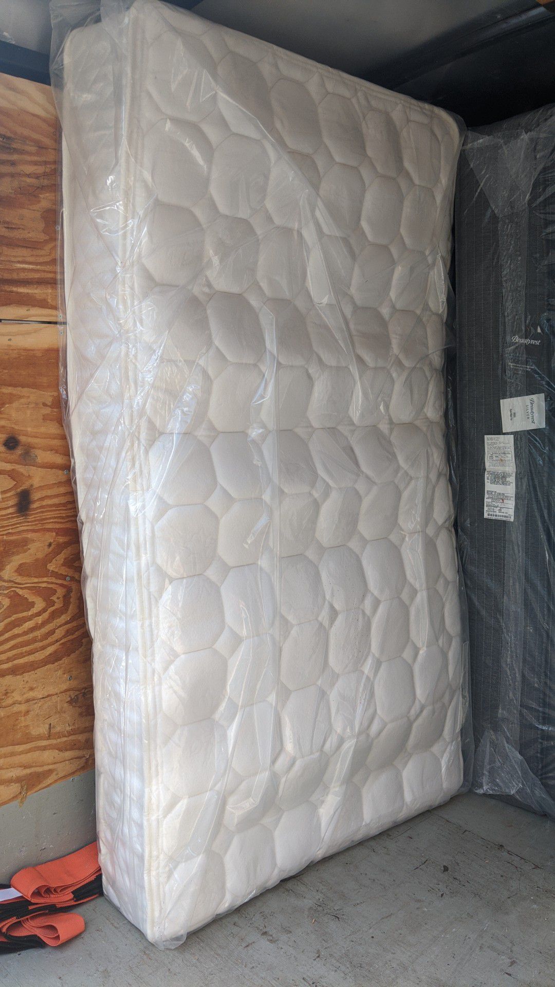 Twin size inner spring mattress $85.