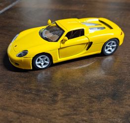 Yellow Porsche Carrera  GT KT5081 Scale 1/36 pull back action