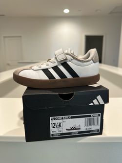Kids white adidas shoes size 12.5