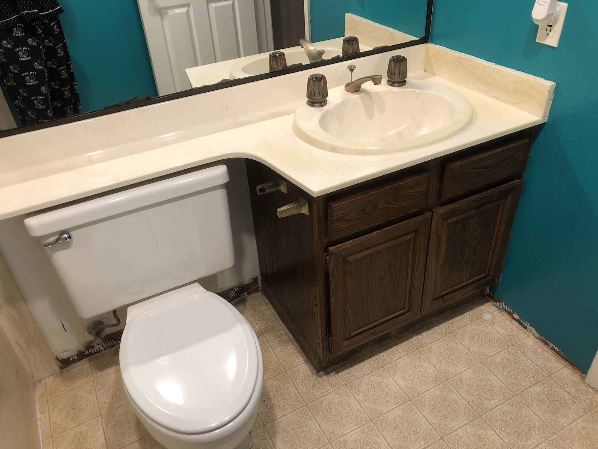 FREE 30” bathroom vanity, fixtures & sink