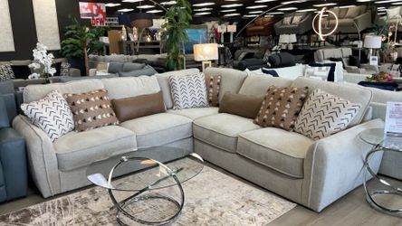 Three-piece sectional pillows included