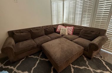 Brown upholstered sectional couch