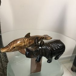 Gorgeous Hand Carved  And Hand Painted  Wooden  Animal Figurines.  Fish is 12.5 inch L and 3.5 inch H and a Rhinoceros L -8 inch and H- 4.5 inch. 