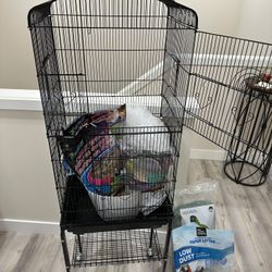 Bird Cage with everything you need. Only thing missing is the bird.