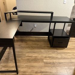 L-Shaped Desk With Shelf, Drawer, And Adjustable Panel For Standing 