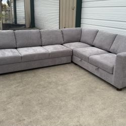 CONVERTIBLE SLEEPER SECTIONAL WITH STORAGE 