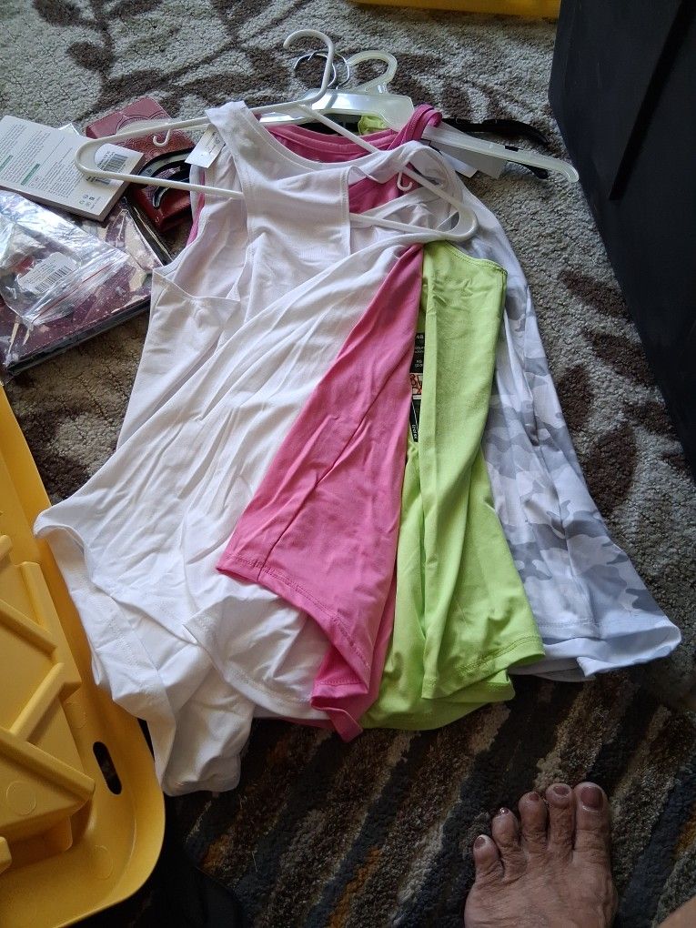 Workout Tops. New. XS, S. New. All 4 For $7