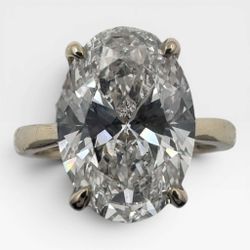 14k Yellow Gold Solitaire Ring with 4.51 Ct. Lab Grown Oval Cut Diamond. (Size 5.50)