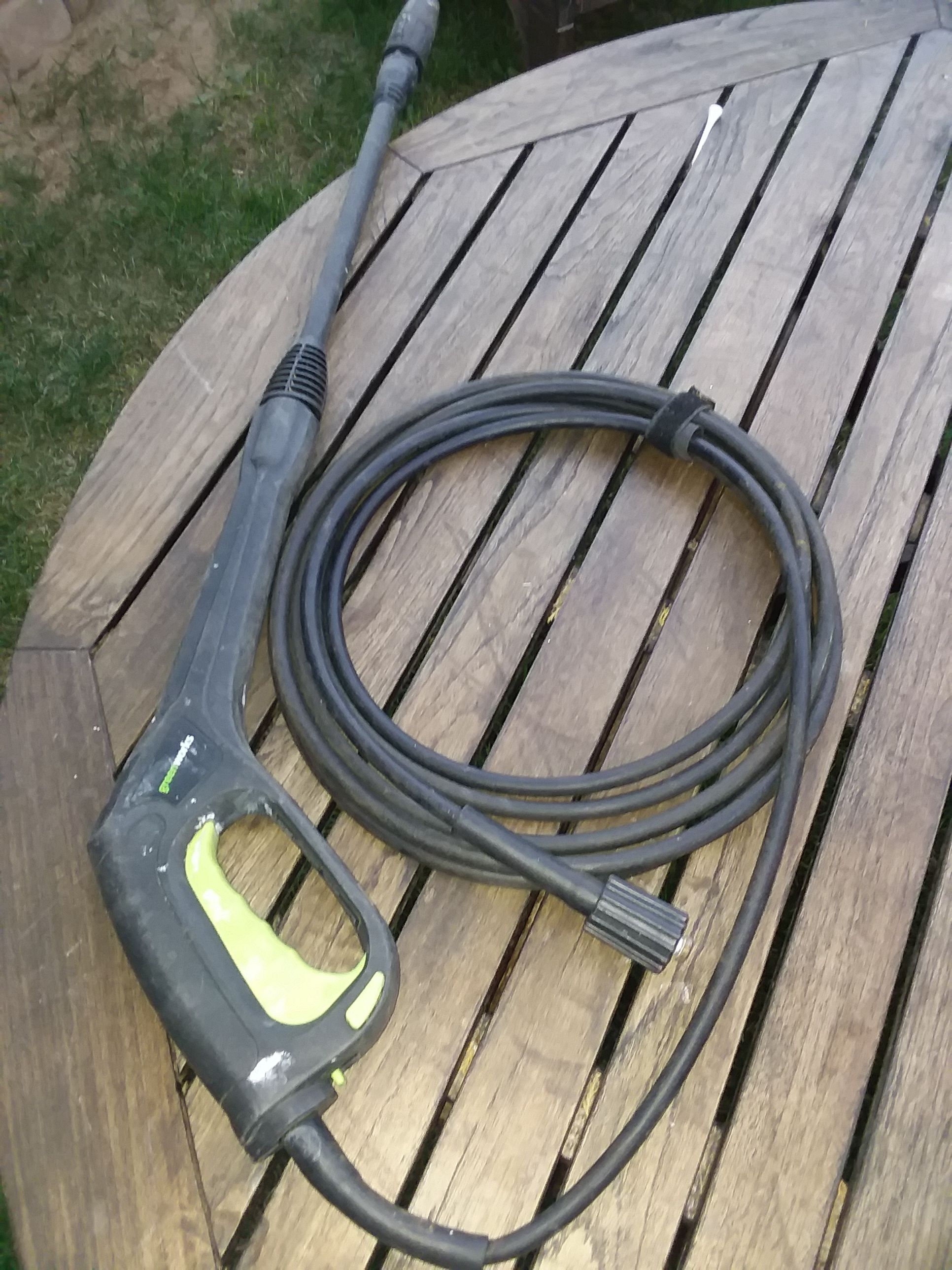 pressure washer wands, greenworks,with attached hoses, and 2 seperate