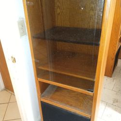 A set Of 2 Stereo Cabinets With Speakers 