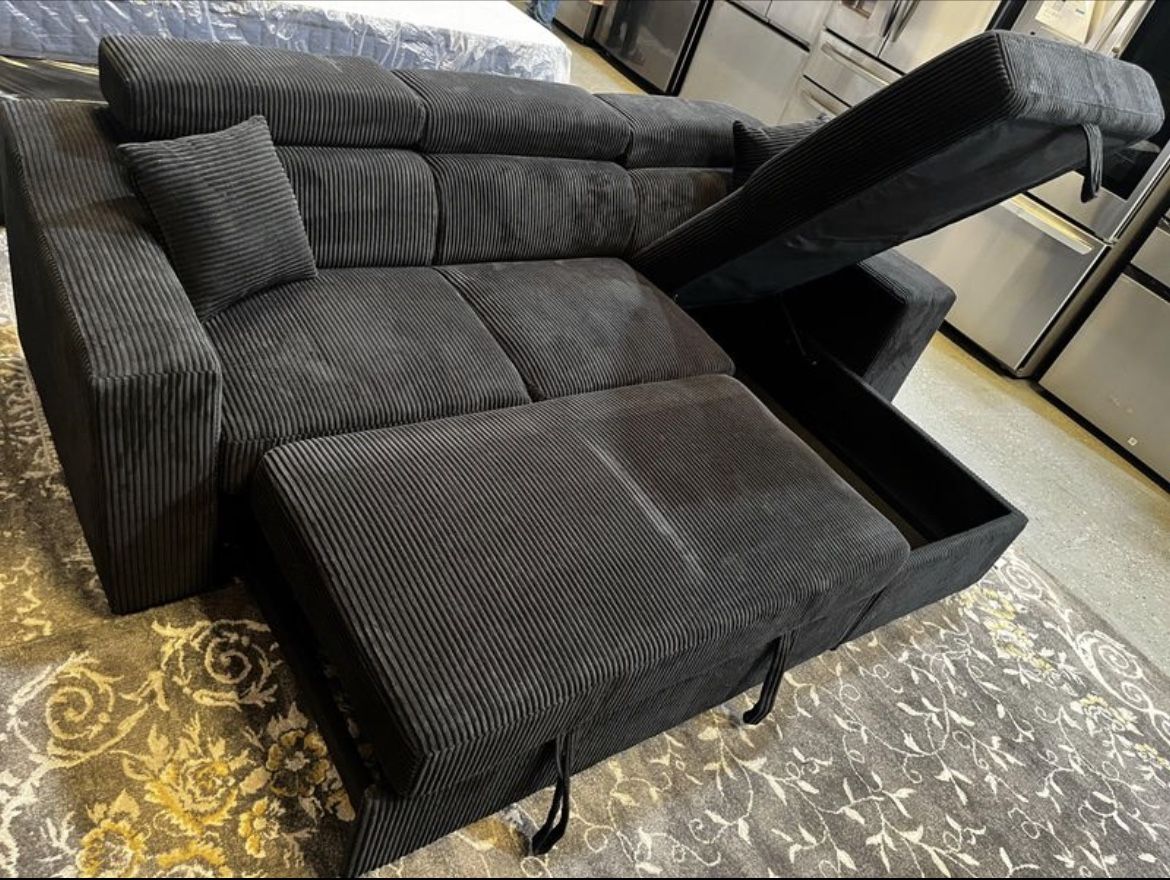 CLEARANCE $849 Reversible Storage Sleeper Sectional with Wireless Charging Pad BRAND NEW IN THE BOX