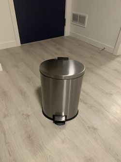 Silver trash can