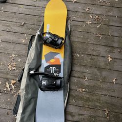 Burton snowboard With Boots And Goggles