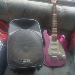 Electric Guitar And Speaker With Amp 