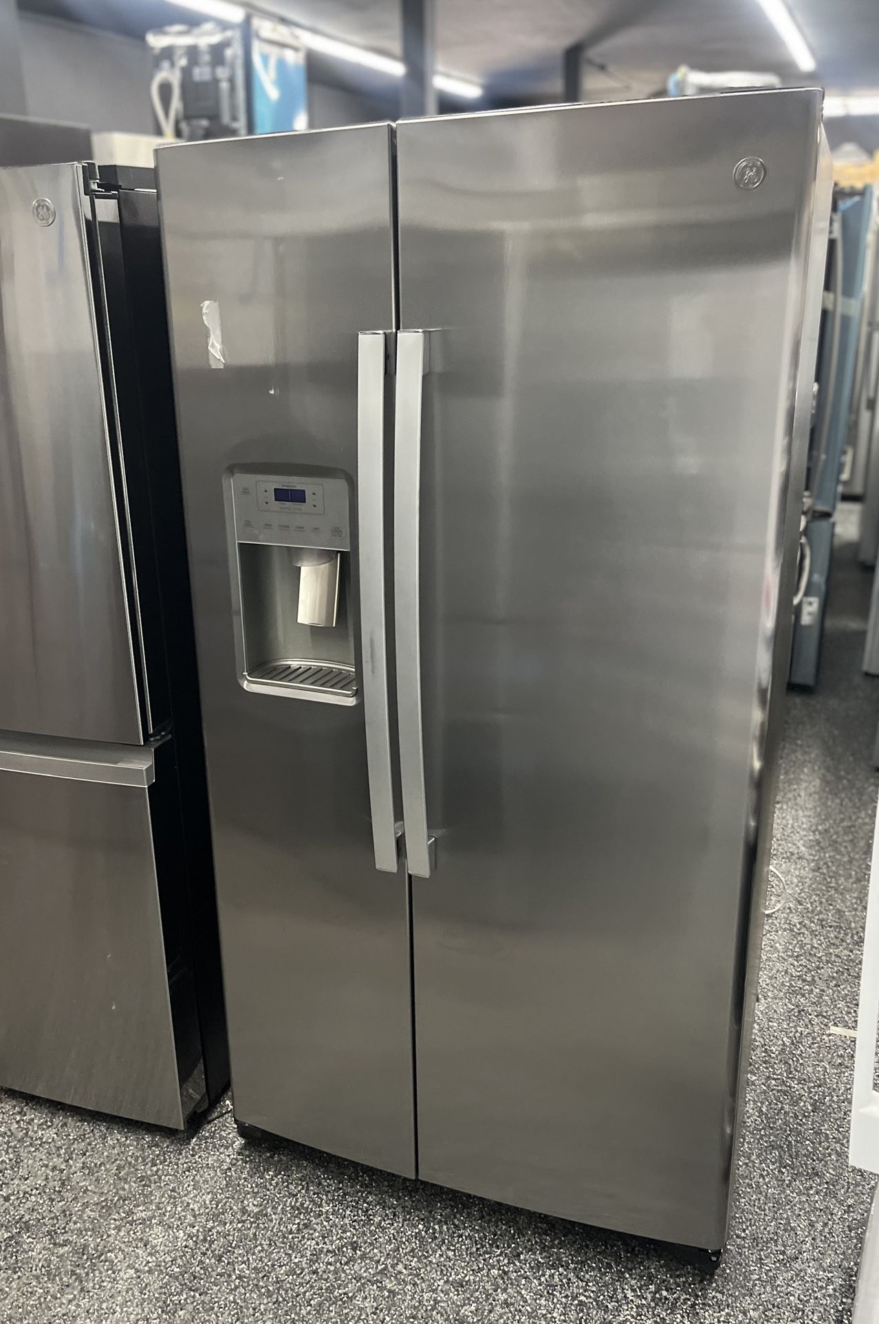 GE Side By Side Stainless Steel Refrigerator Open Box